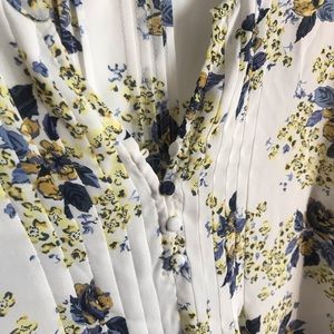 DALIA floral print blouse.